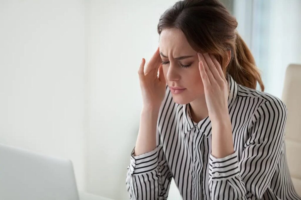 Woman suffering from headache